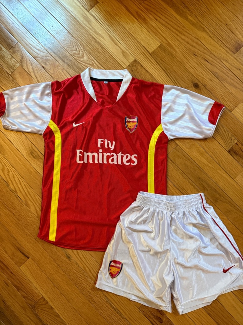Vintage Nike Kids Red and White Arsenal Soccer Jersey and Shorts Early 2000s